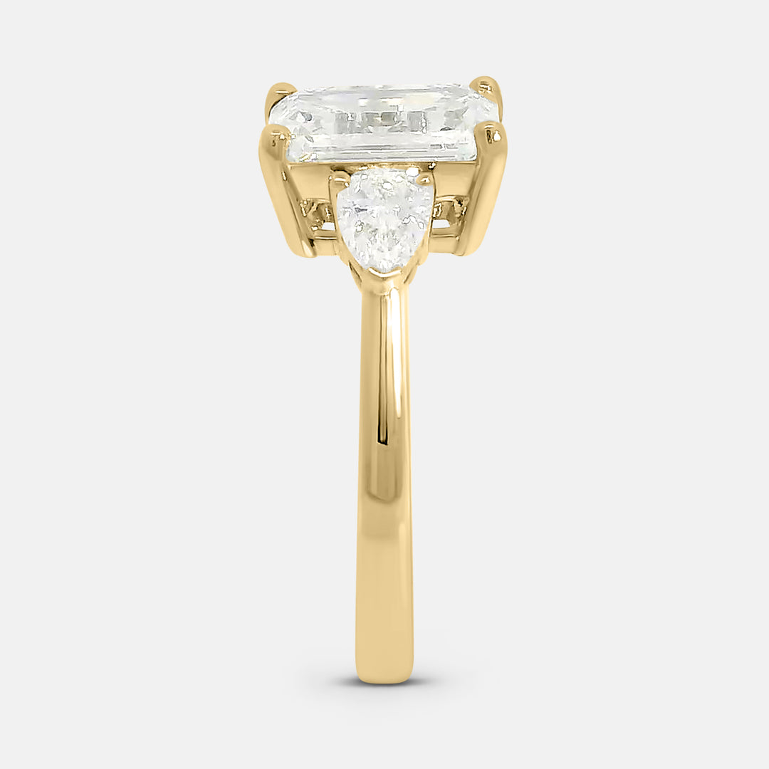 Candace Emerald w/ Tapered Pear Engagement Ring