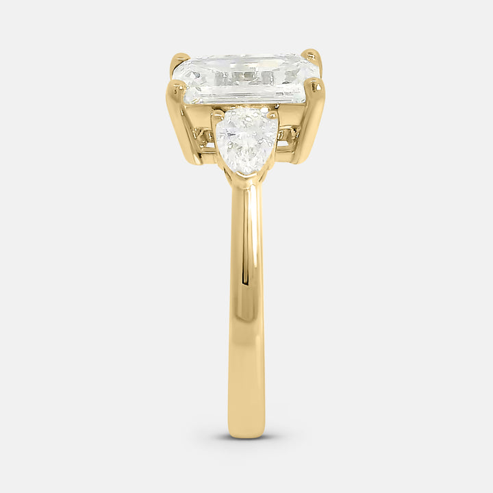 Candace Emerald w/ Tapered Pear Engagement Ring