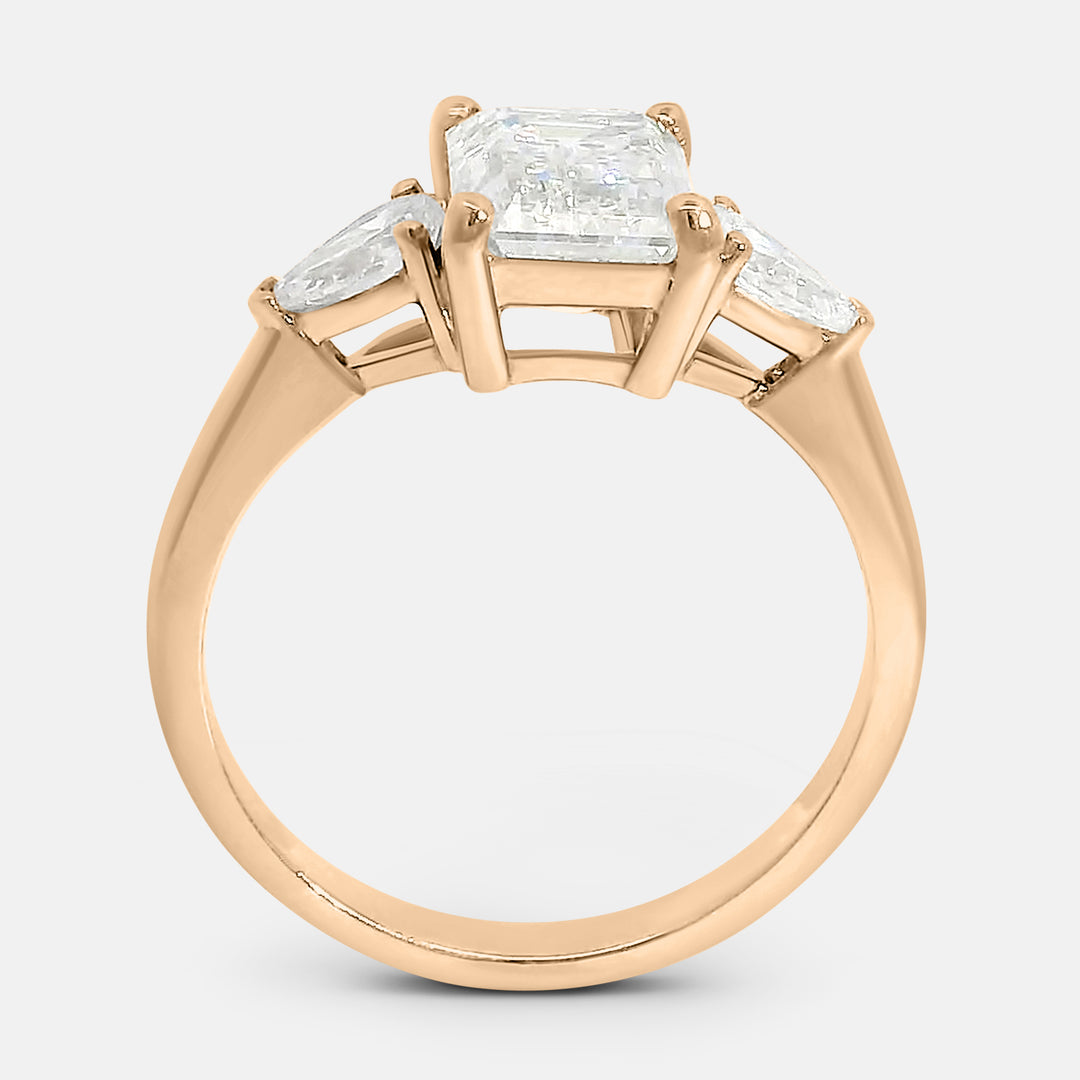 Candace Emerald w/ Tapered Pear Engagement Ring