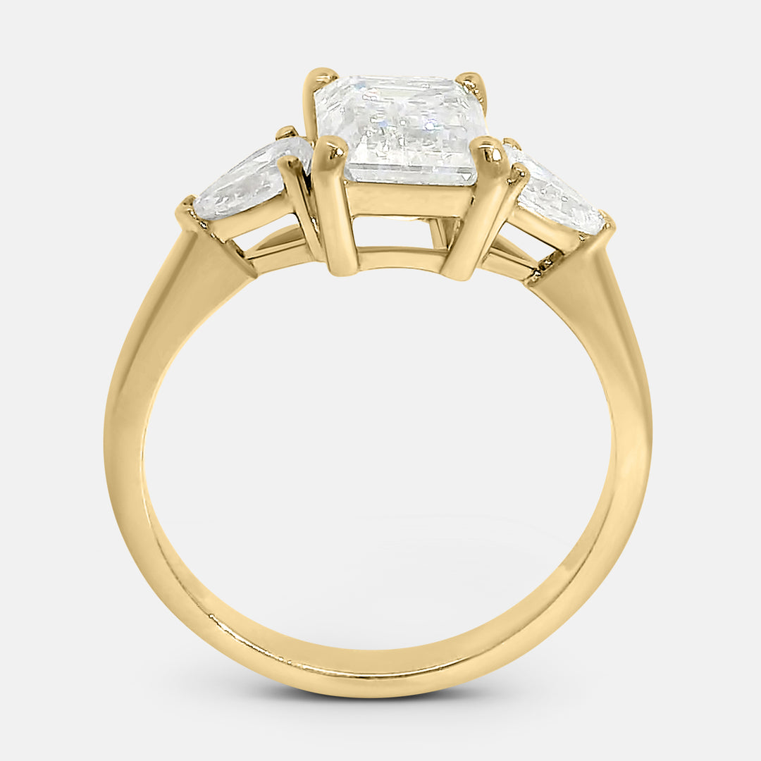 Candace Emerald w/ Tapered Pear Engagement Ring