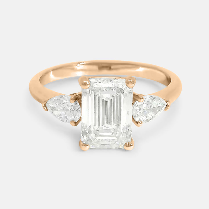 Candace Emerald w/ Tapered Pear Engagement Ring