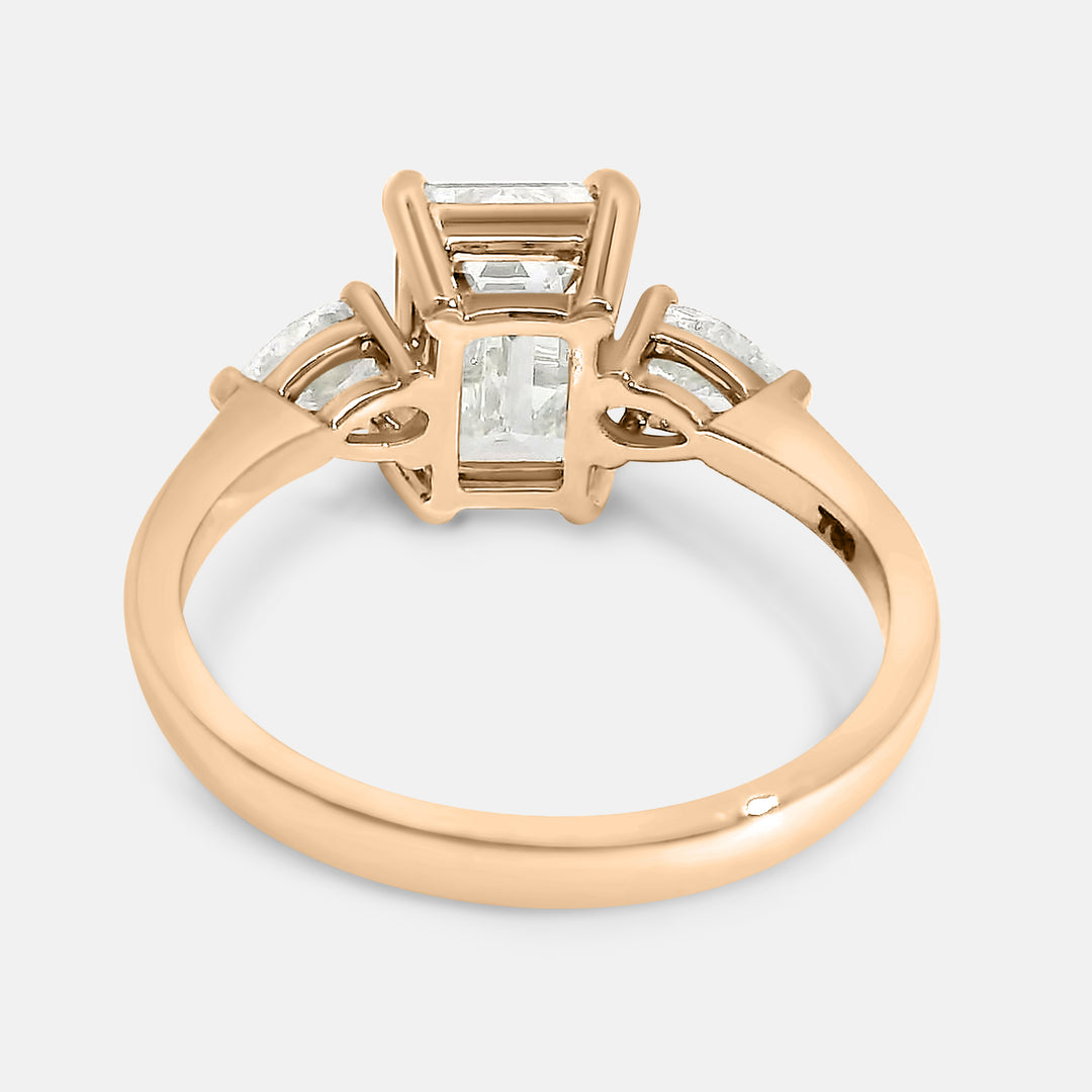 Candace Emerald w/ Tapered Pear Engagement Ring