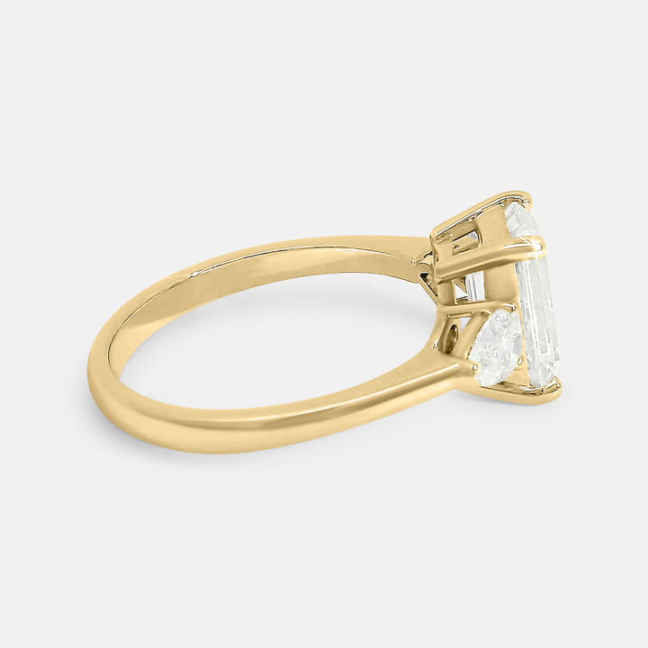 Candace Emerald w/ Tapered Pear Engagement Ring