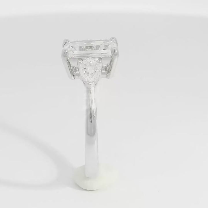 Candace Emerald w/ Tapered Pear Engagement Ring
